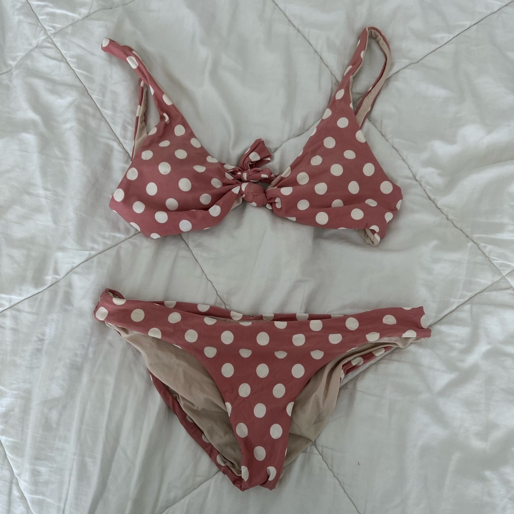 Pink and white polka dot bikini set. Center bow tie and bottom scrunch.